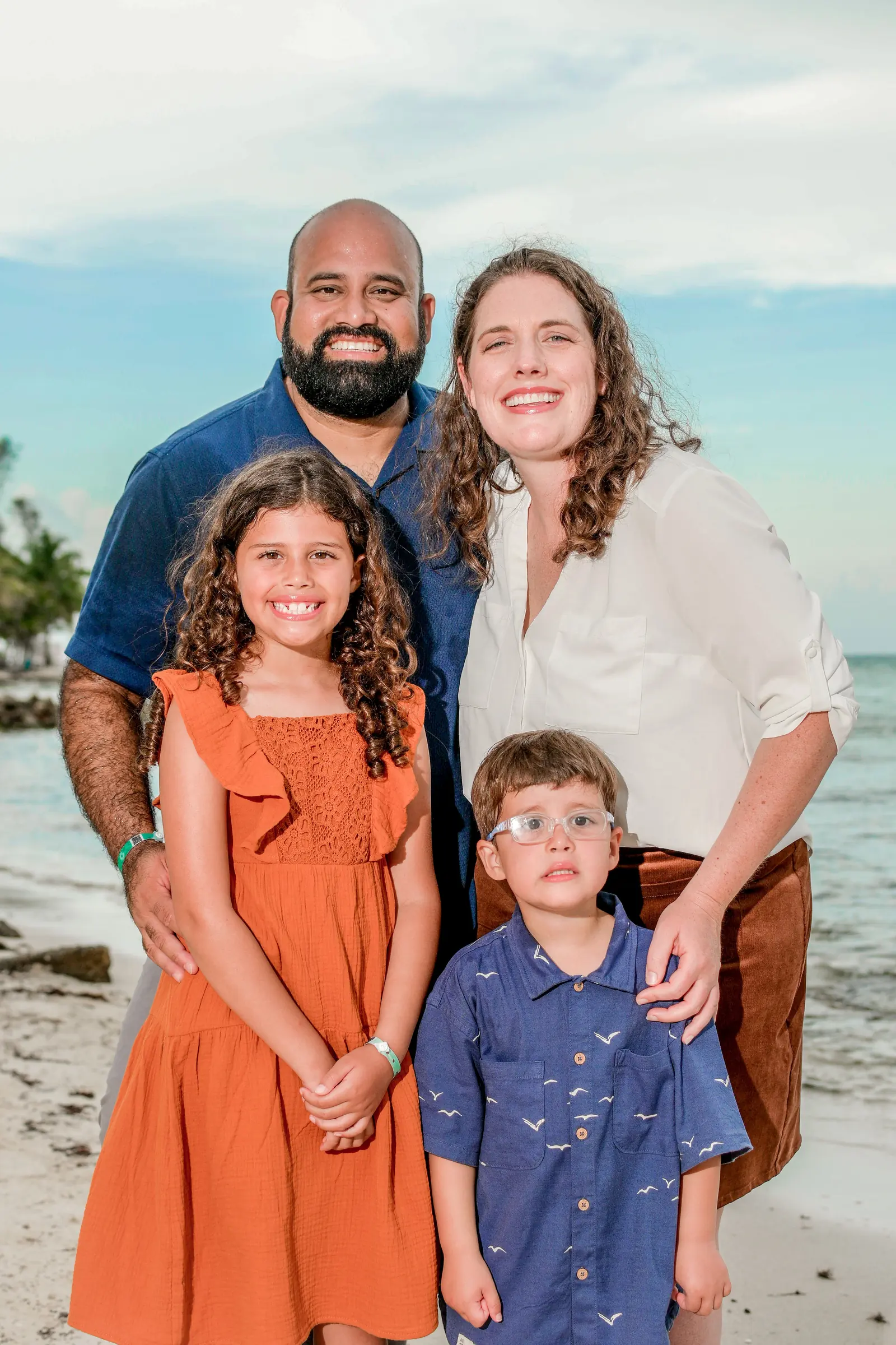 Kate Spilsbury with her husband and kids at the beach
